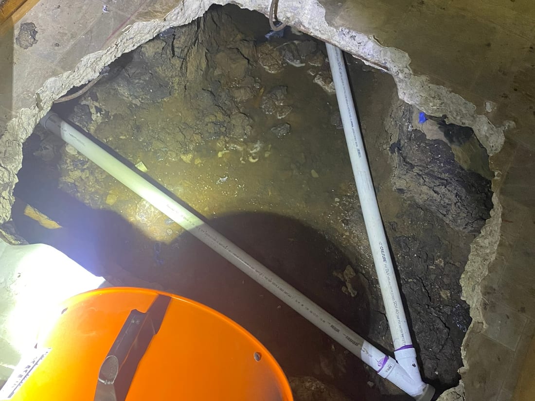 An under-slab leak repair with new PVC line by Encore Plumbing, Arlington